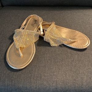 8.5 Rose Gold flats with Aurora borealis rhinestones.